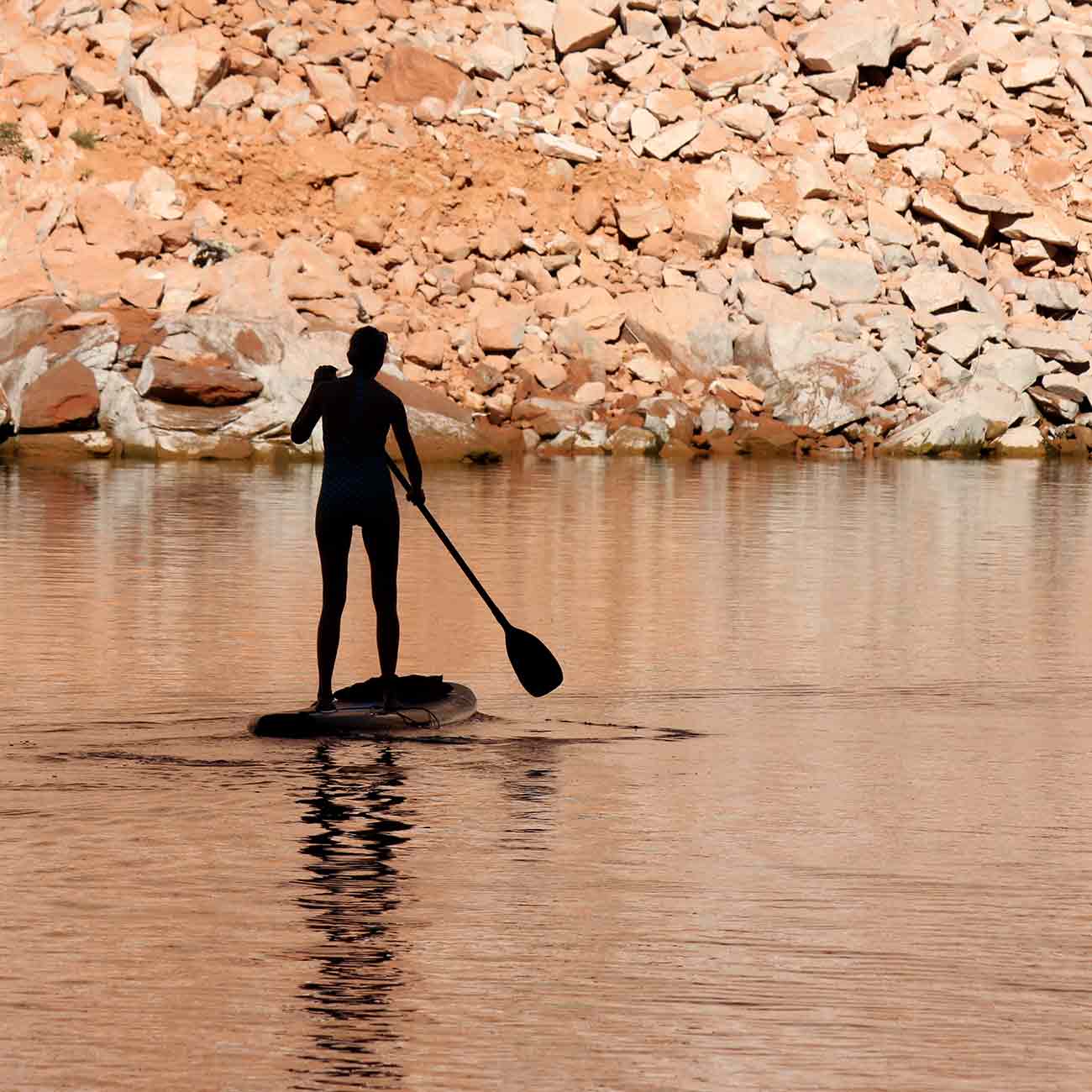 Woman paddleboarding at Lake Powell
